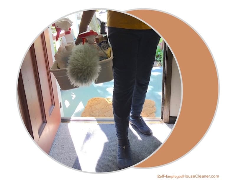 Self-employed house cleaner entering a home fully equipped ready to work.